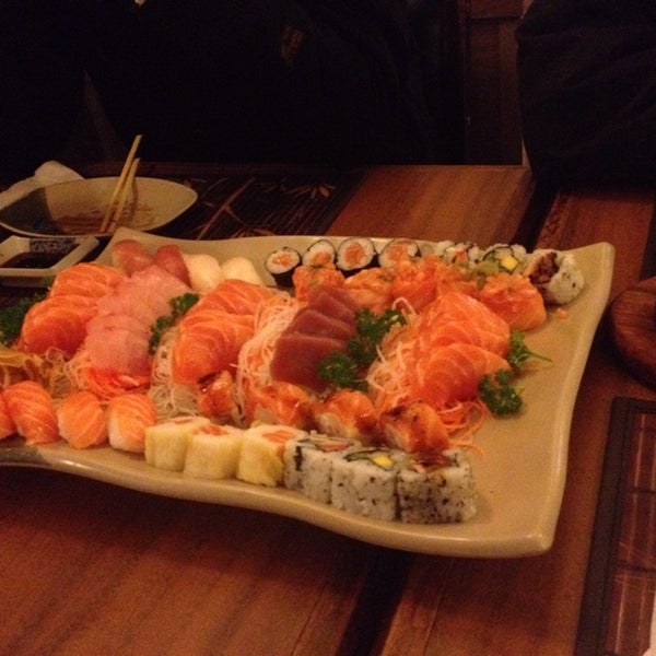 Photo taken at Sushi Mart by Alexandre A. on 7/25/2014