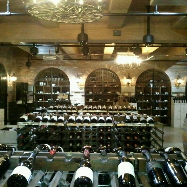 Photo taken at Wine Library by Jessica K. on 3/10/2013