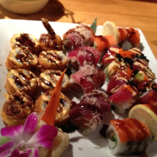 Photo taken at Mura Japanese Restaurant by Ed S. on 10/24/2012