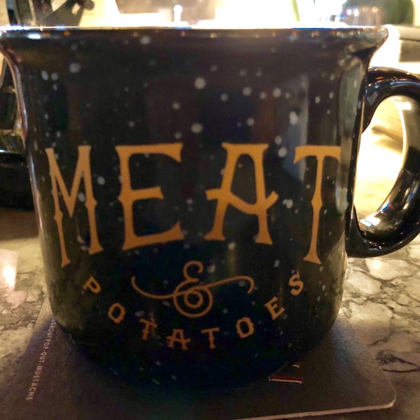Photo taken at Meat and Potatoes by Melissa C. on 6/10/2018