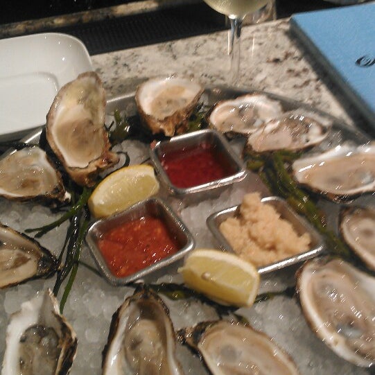 Photo taken at Wild Sea Oyster Bar &amp; Grille by Foodiestrid on 4/26/2014