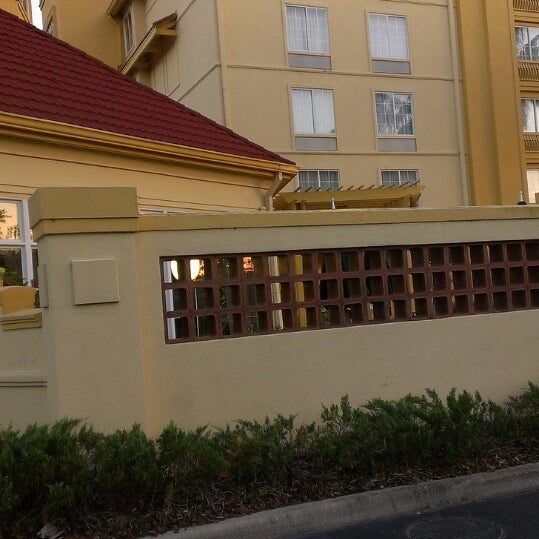 Photo taken at La Quinta Inn &amp; Suites Orlando Airport North by April T. on 4/23/2013