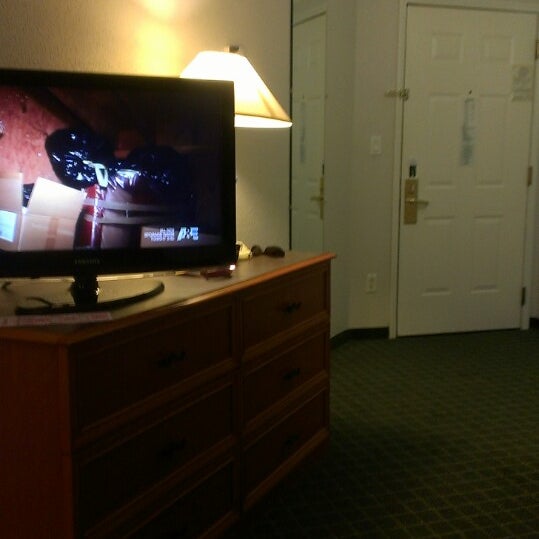 Photo taken at La Quinta Inn &amp; Suites Orlando Airport North by April T. on 5/7/2013