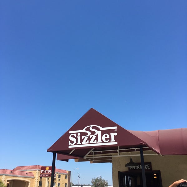 Photo taken at Sizzler by Beth G. on 7/16/2016