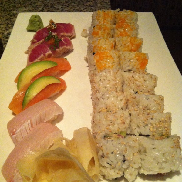 Photo taken at Sushi Den by Scott H. on 5/3/2013
