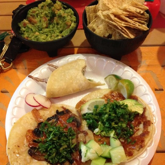 Photo taken at Tacos El Chilango by Rose T. on 12/20/2012