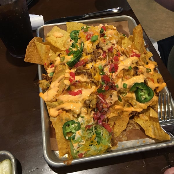 I got the nachos with pulled pork. They were massive but so worth it. The cheese is seasoned perfectly to complement the pork.
