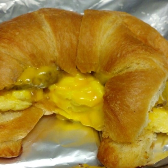 The sausage, egg, and cheese (scrambled) croissant is amazing and enough to share!