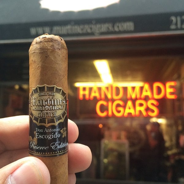 Photo taken at Martinez Handmade Cigars by Conrado V. on 5/1/2015