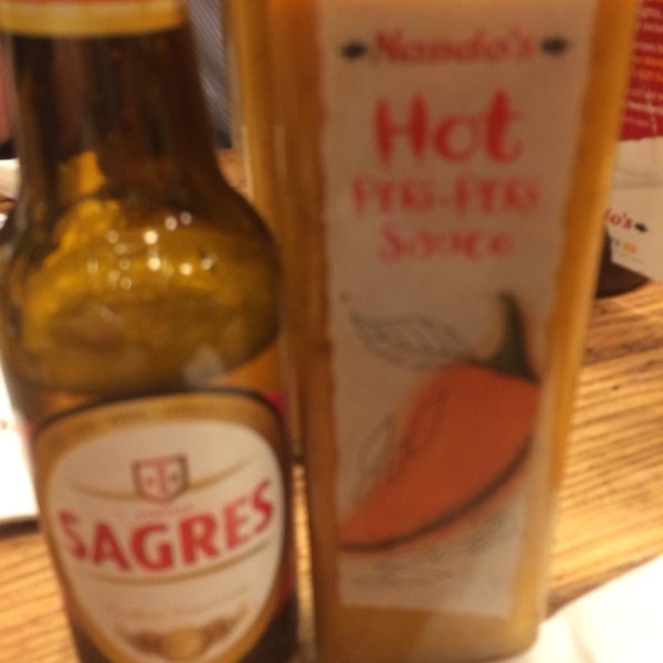 Photo taken at Nando&#39;s by James M. on 12/3/2013
