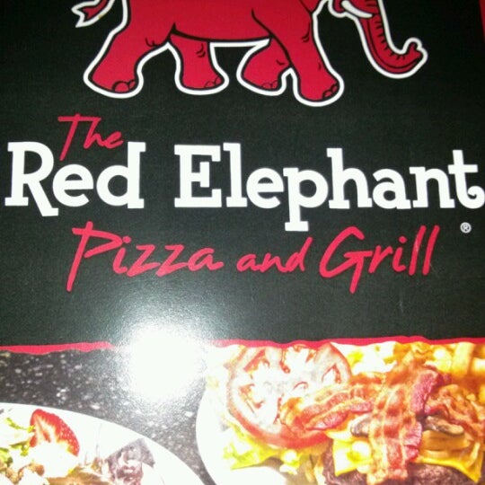 Photo taken at Red Elephant Pizza &amp; Grill by Christopher J. on 9/30/2012