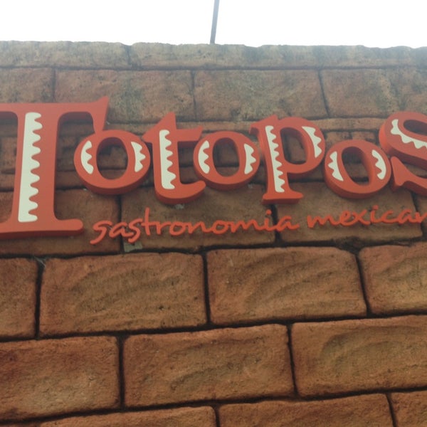 Photo taken at Totopos Gastronomia Mexicana by 41 Delivery C. on 3/12/2013