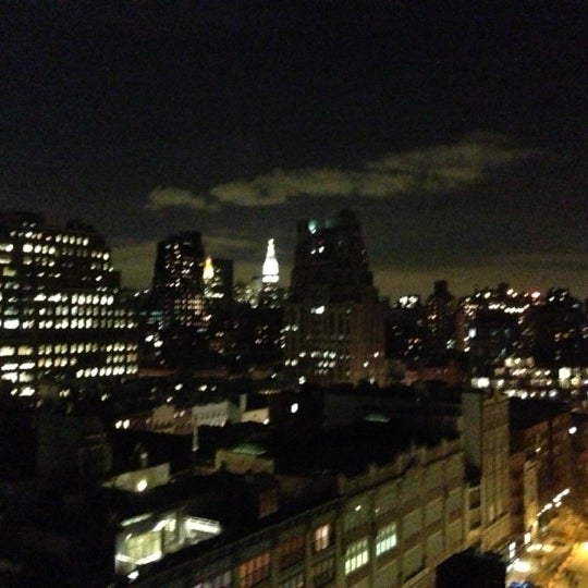 Photo taken at Plunge Rooftop Bar &amp; Lounge by Julien S. on 11/20/2012