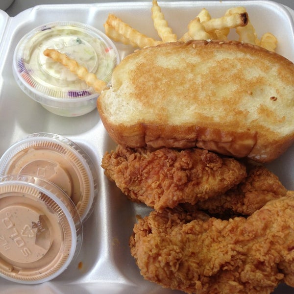 Photo taken at Raising Cane&#39;s Chicken Fingers by Sam P. on 2/15/2013