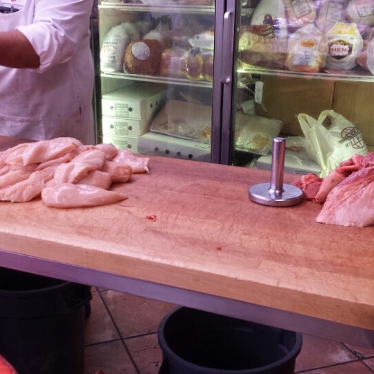 Photo taken at International Meat Market by dennis on 9/13/2014