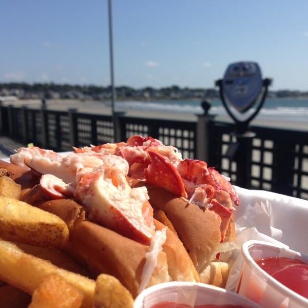 Two fresh lobster rolls on perfectly buttered buns for $11.97 with a side of perfectly fried fries and an ocean view!? YES, PREASE.