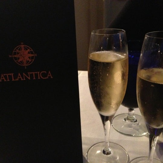 Photo taken at Atlantica Restaurant by Michael L. on 10/27/2012