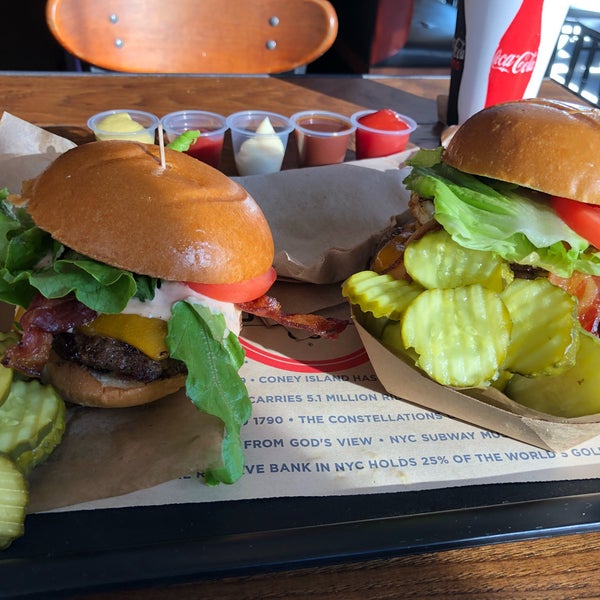 Photo taken at New York Burger Co. by Joshua G. on 9/30/2018