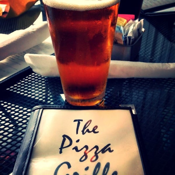 Photo taken at The Pizza Grille by Shawn G. on 8/23/2014