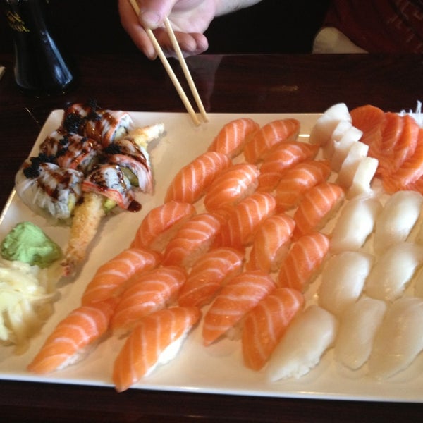 Photo taken at Sushi Kingdom by Erin M. on 7/5/2013