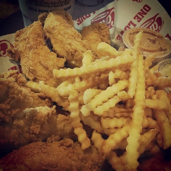 Photo taken at Raising Cane&#39;s Chicken Fingers by Andy S. on 1/20/2014