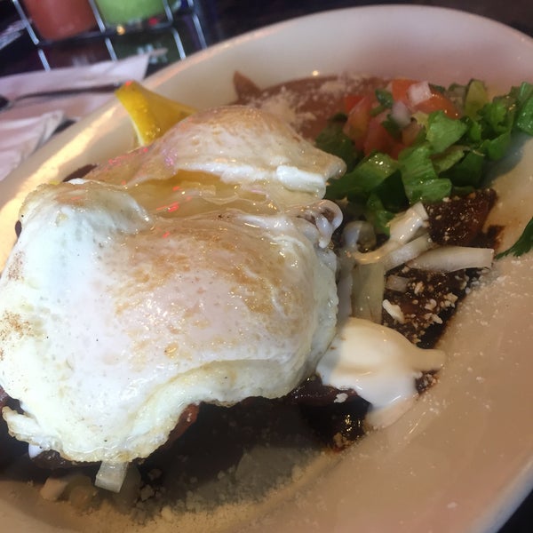 Mole chilaquiles, ordered with overeasy eggs, but they were undercooked.