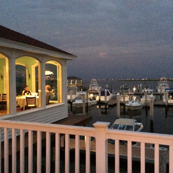 Photo taken at Tavern On The Bay by Bill S. on 7/17/2014