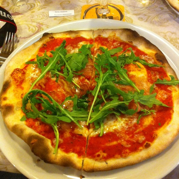 Photo taken at Casanova Ristorante Pizzeria by Oscar L. on 6/21/2014