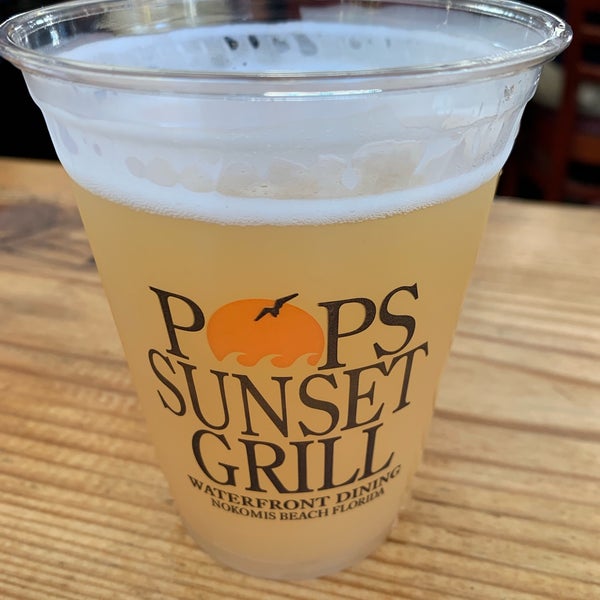 Photo taken at Pop&#39;s Sunset Grill by Garrett K. on 4/28/2019
