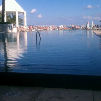 Photo taken at Pool at the Diplomat Beach Resort Hollywood, Curio Collection by Hilton by Eric C. on 11/1/2012