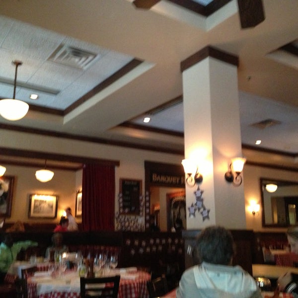 Photo taken at Maggiano&#39;s Little Italy by Ingrid L. on 5/11/2013
