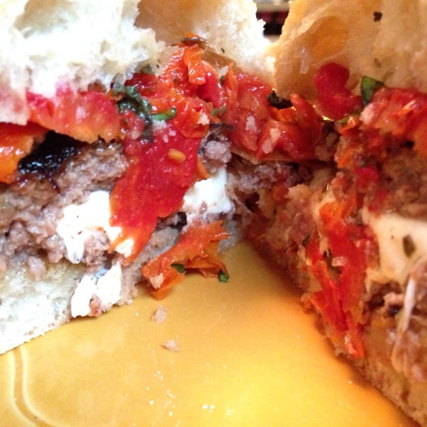 Bruschetta stuffed burger. Smokey and cheesy. Don't let it fool you this is not your average pub food.