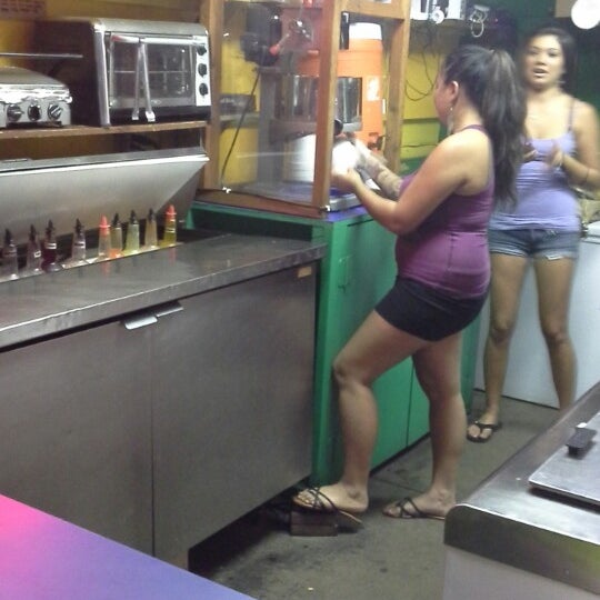 Photo taken at Local Boys Shave Ice - Kihei by Mike C. on 12/13/2013