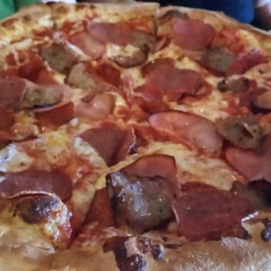 Photo taken at Mofo&#39;s Pizza &amp; Pasta by J.D. B. on 7/4/2014