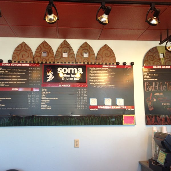 Photo taken at Soma Coffeehouse &amp; Juice Bar by Rosie B. on 8/24/2013