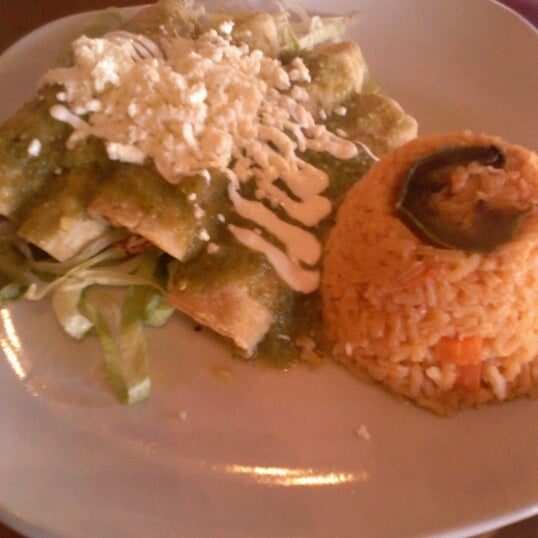Photo taken at La Catedral Cafe &amp; Restaurant by Hugh M. on 10/21/2012