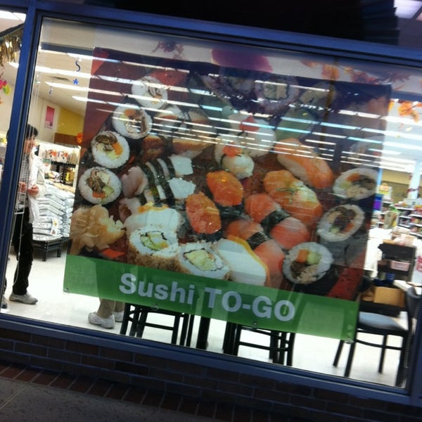 Photo taken at Tensuke Market &amp; Sushi Cafe by Tracy B. on 4/1/2013