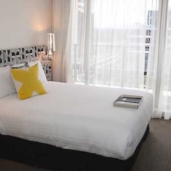See what the rooms are really like before you check in. View real guest photos and video of QT Hotel Canberra Junior Suite Room 906.