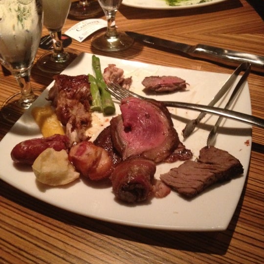 Photo taken at Chima Brazilian Steakhouse by Jeff G. on 12/13/2012