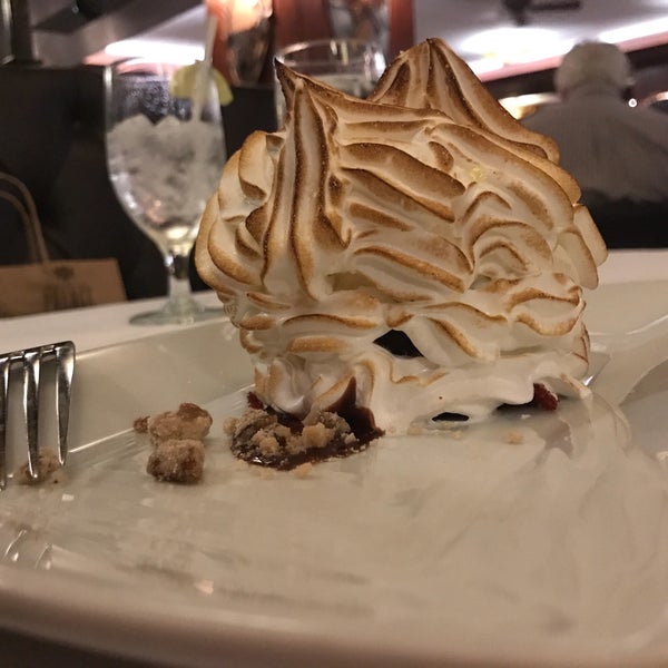 Baked Alaska NOLA style - made with Creole cream cheese ice cream and red velvet cake.