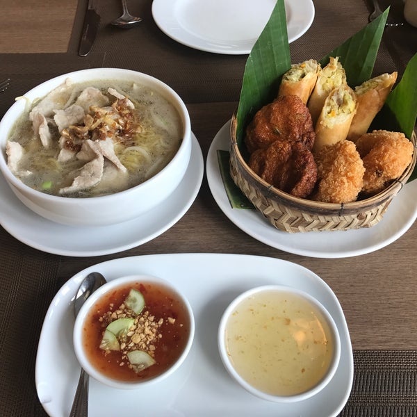 Photo taken at Aquatini Riverside Restaurant &amp; Bar by สันติธร ย. on 8/15/2019