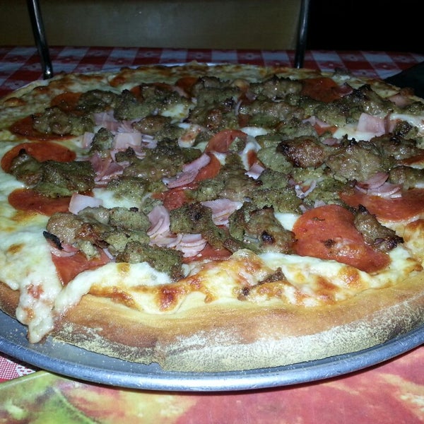 Photo taken at Bobby V&#39;s Italian Restaurant Pizzeria by Robert W. on 8/1/2014