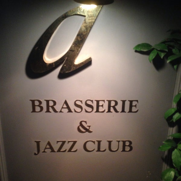 Photo taken at Divine Brasserie &amp; Jazz Club by Gorkem E. on 3/6/2015
