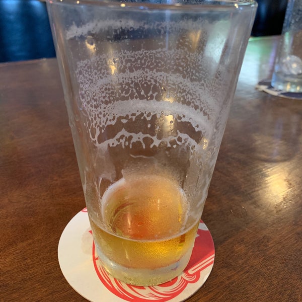 Photo taken at Grunions Sports Bar &amp; Grill by Adam S. on 4/12/2019