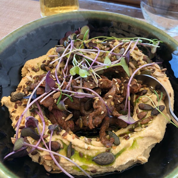 The hummus with beef was excellent! Amazing view over the beach. I can’t give like, because the waitress added tip to my credit card bill without telling me and then took another tip from me in cash.