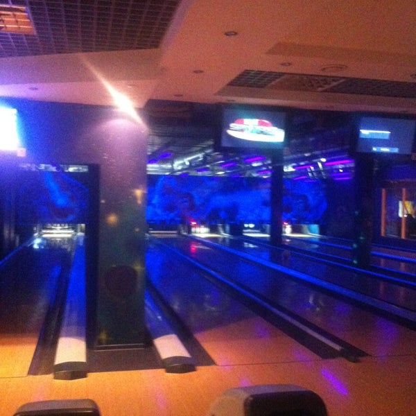 Photo taken at КосмоДоМ bowling &amp; bar by Yan on 2/22/2013