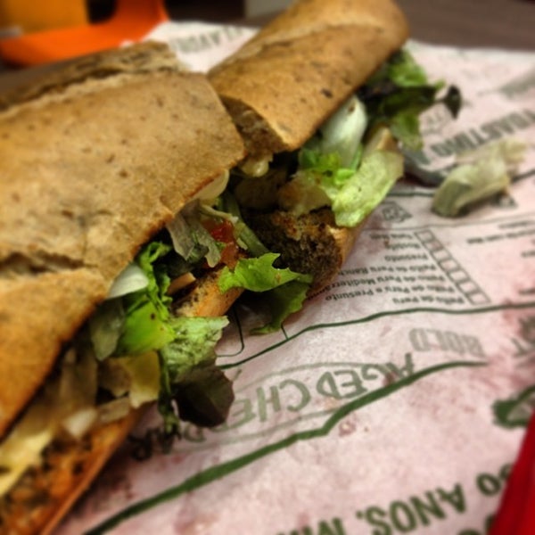 Photo taken at Quiznos Sub by Lívia F. on 12/29/2013