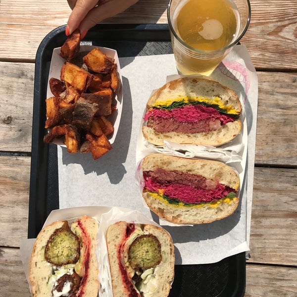 Quality ingredients, inventive yet comfortable sandwiches, beer and wine on tap, outdoor picnic table seating, and a good overall atmosphere.