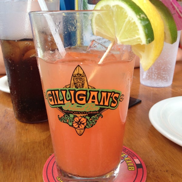 Photo taken at Gilligan&#39;s Island Bar and Grill by Aaron S. on 4/23/2013