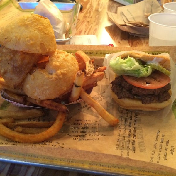 Photo taken at BurgerFi by Emily L. on 3/19/2014